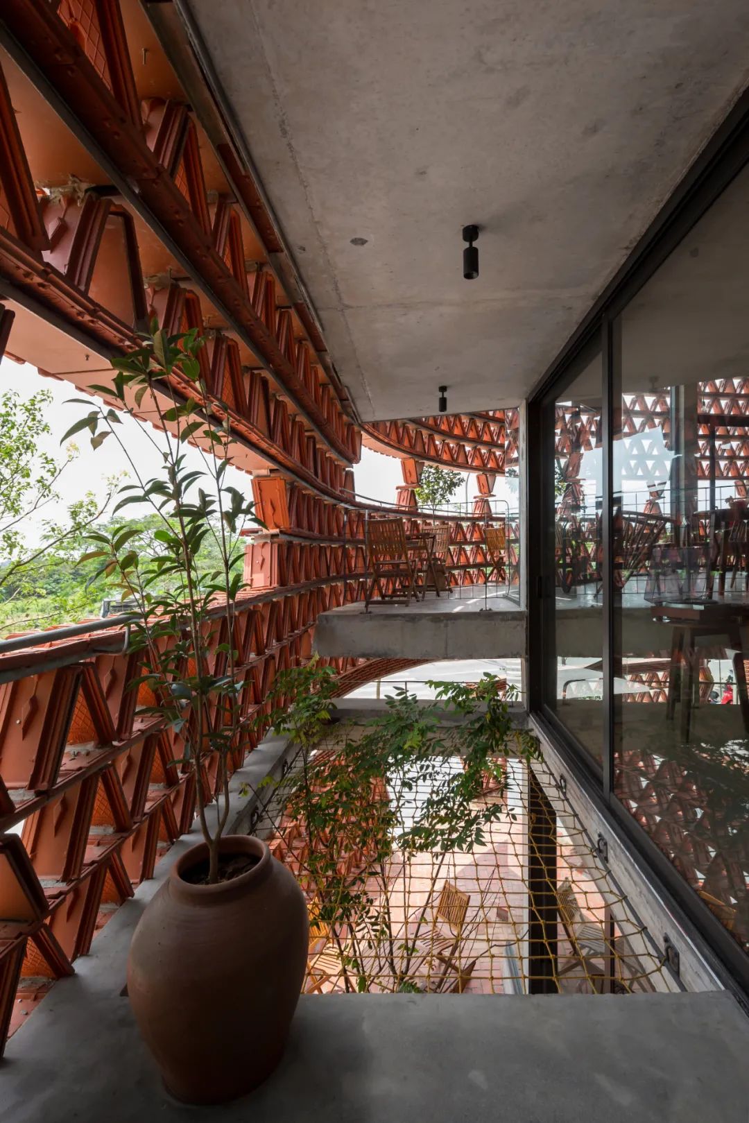 河內Ngói磚殼社區中心／H&P Architects