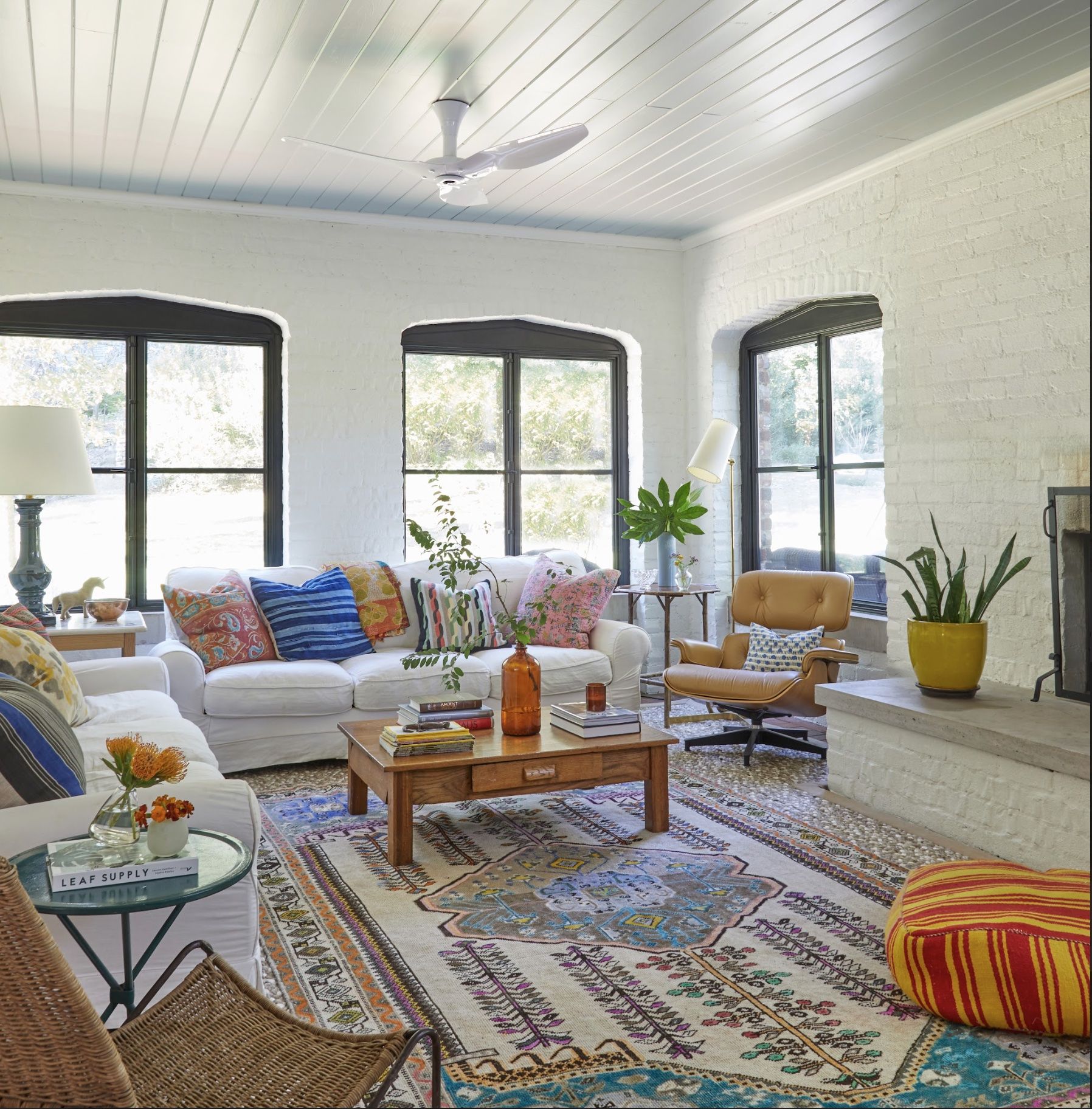 a living room with a rug and a coffee table©Jean Allsopp