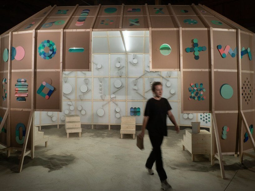 whirring panels animate pinaffo & pluvinage's cardboard installation, powered solely by sand 