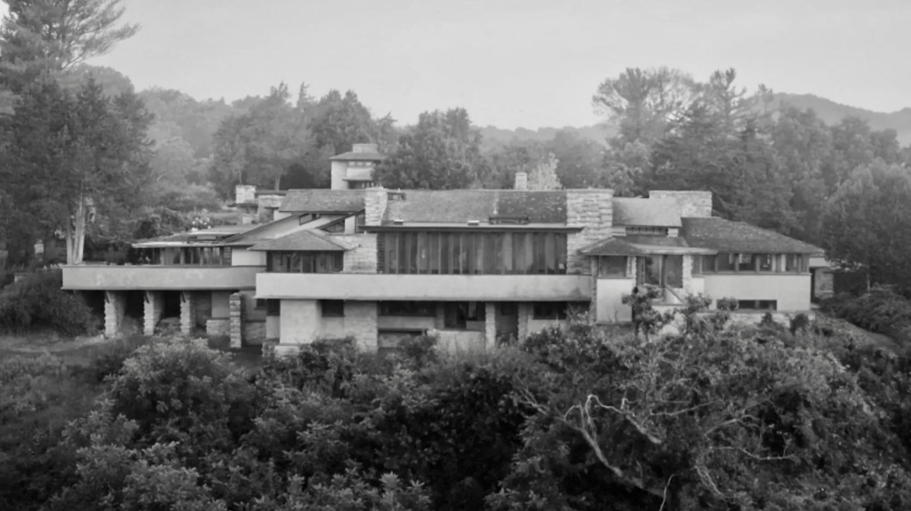 TALIESIN

Wright’s home, studio, and garden sanctuary was a laboratory for architecture and design. In its three iterations, Taliesin embodies Wright’s ideas of organic architecture, expanded and refined from his earlier Prairie School works. From the courtyards and gardens to the Living Room, Loggia, and Birdwalk, Taliesin offers a commanding view of the valley, settled by Wright’s Welsh ancestors. Using natural local limestone and Wisconsin River sand, Taliesin stands as the “shining brow” on Wright’s favorite boyhood hill.
