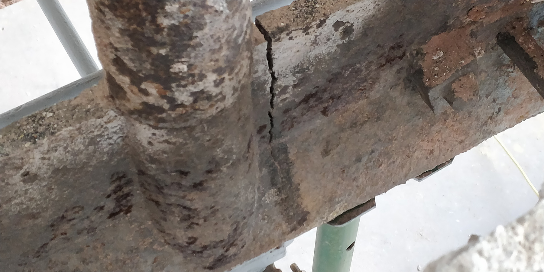 Due to differential settlement and timber-bearing deterioration, some internal beam ends were up to two-thirds cracked. (Photograph courtesy of AKT II)