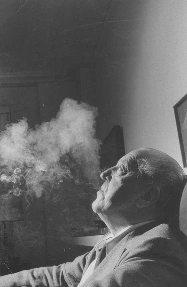Mies van der Rohe with smoke, 1957; photographed for Life magazine. Image © Frank Scherschel/Time & Life Pictures/Getty Images